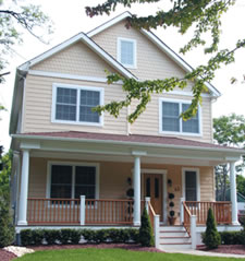 Middletown, NJ narrow lot home with long front porch and stately columns provides a nice look and functionality. 